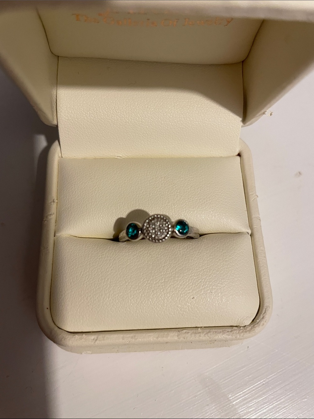 Sterling Silver Simulated Diamonds with Emerald Gem Accents